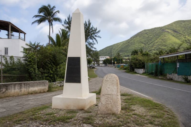 The stone border marker on the road between Sint Maarten and Saint-Martin.